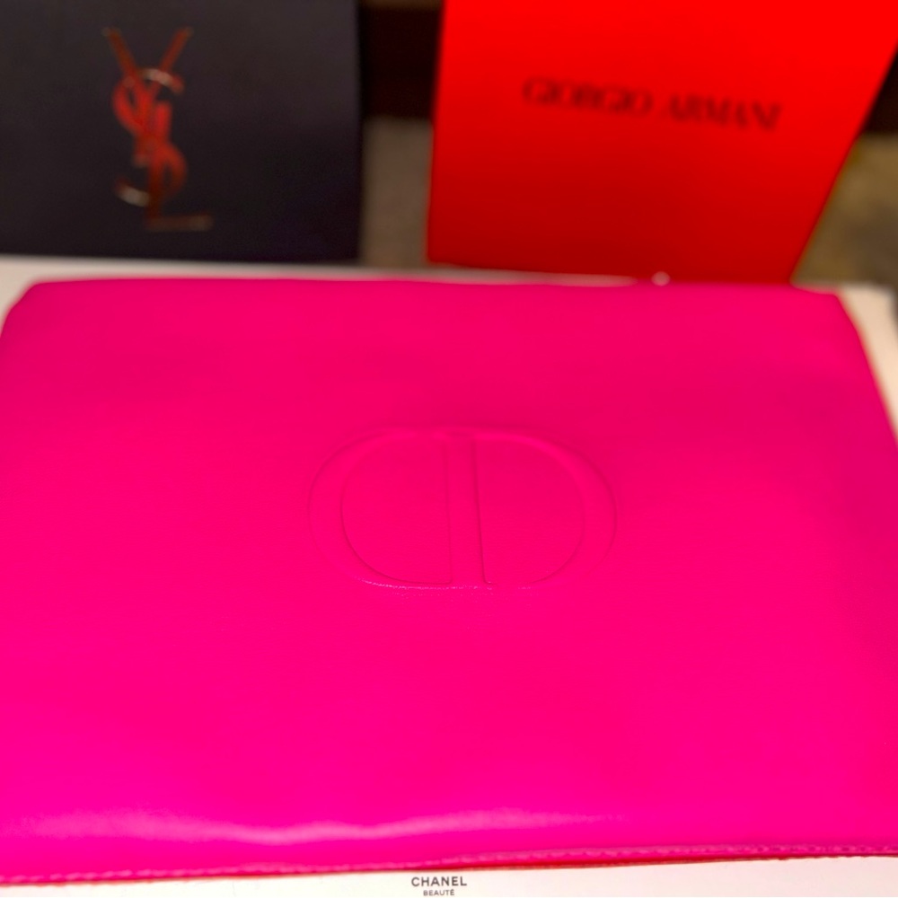 2 toned Dior beauty cosmetic bag